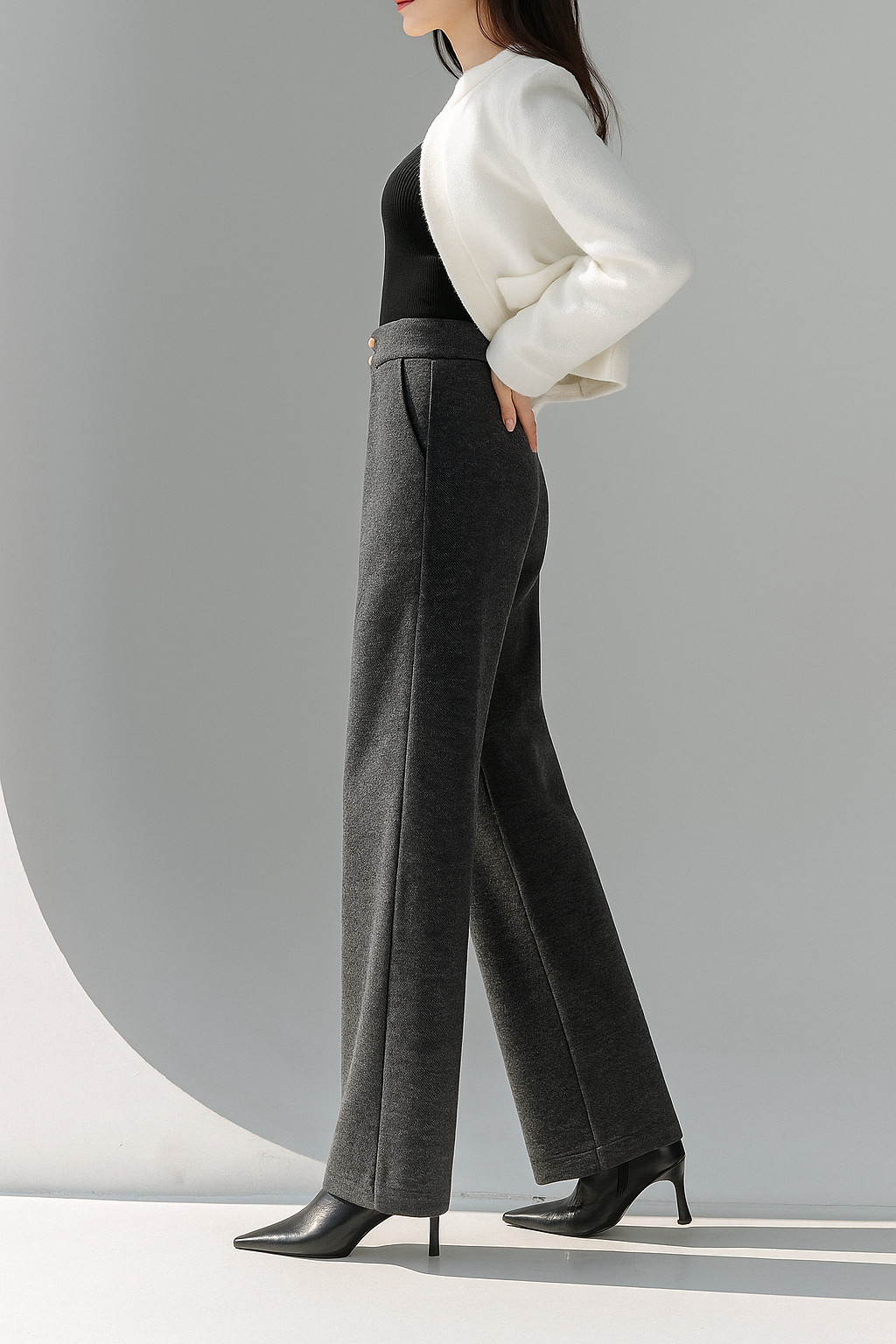 Tailored wide-leg trousers for women by Christine Brewer, featuring a stylish fit and classic design in neutral fabric.