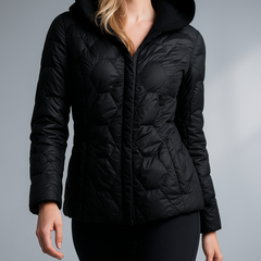 Christine Brewer Zoe women's hooded quilted puffer jacket displayed on a mannequin, featuring a stylish quilted design and hood.