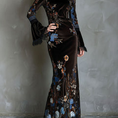 Velvet floral evening dress by Christine Brewer featuring a fitted silhouette and elegant floral pattern for special occasions.