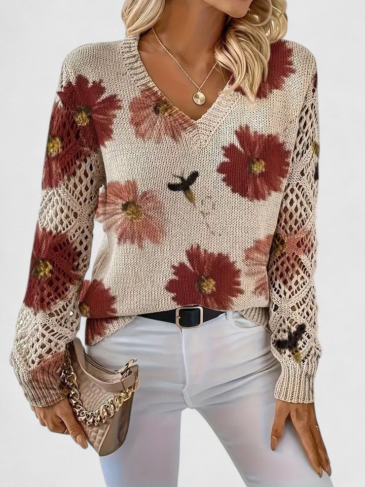 Women’s floral V-neck cardigan by Christine Brewer, featuring a colorful floral pattern and lightweight knit fabric.