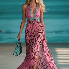 Pink chiffon V-neck maxi dress for women by Christine Brewer, featuring a flowing fabric and elegant design.