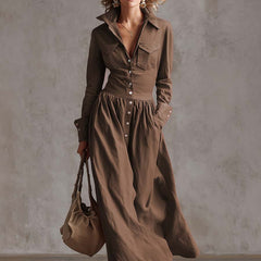 Red linen maxi dress by Christine Brewer featuring a flowing design and casual style, perfect for warm-weather wear.