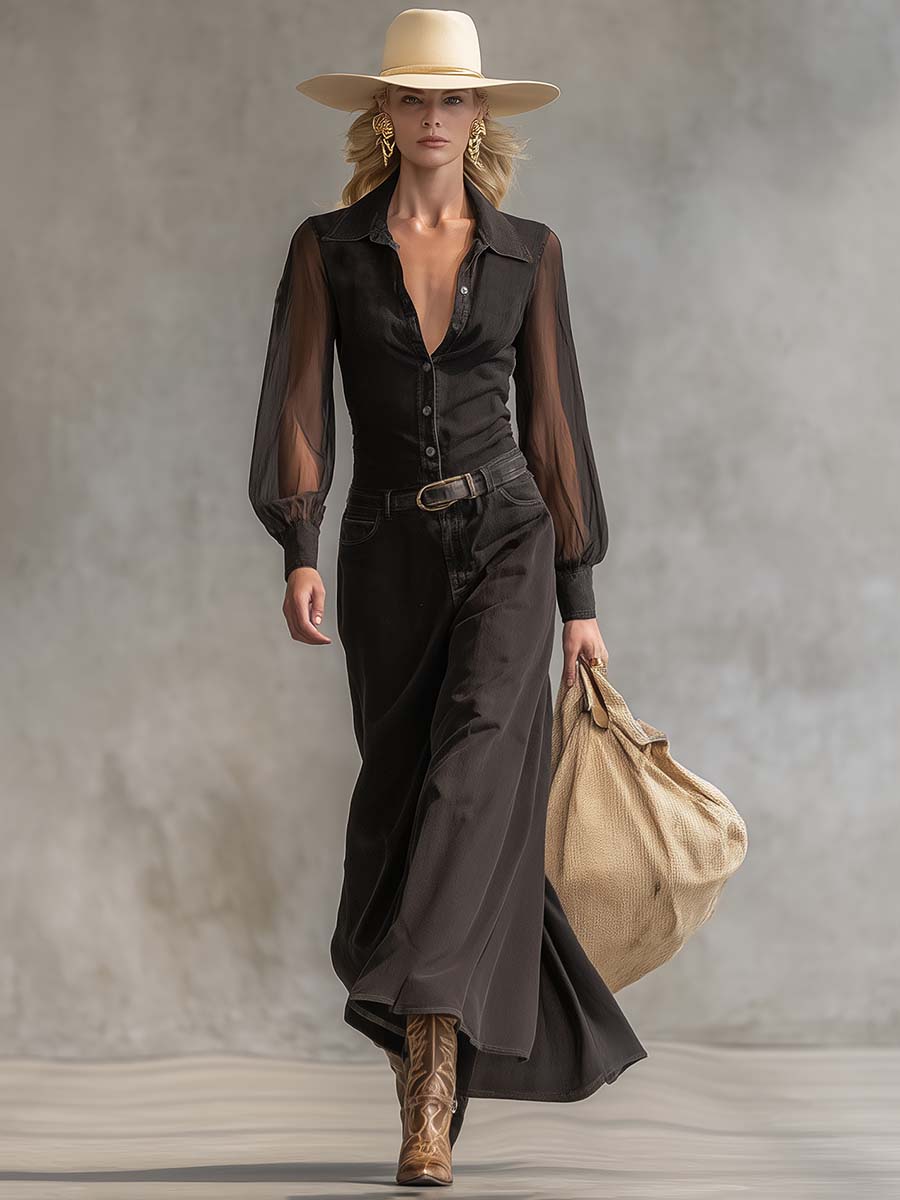 Black denim V-neck maxi dress by Christine Brewer, casual style with flowing length and sleeveless design, shown on a model.