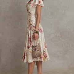 Christine Brewer chiffon floral midi dress, elegant evening dress with flowing fabric and vibrant floral pattern.