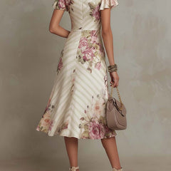 Christine Brewer chiffon floral midi dress, elegant evening dress with flowy fabric and vibrant floral pattern, perfect for special occasions.