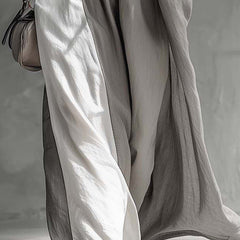 Color-blocked sleeveless maxi dress with round neck and casual pockets by Christine Brewer, featuring a loose fit and vibrant style.