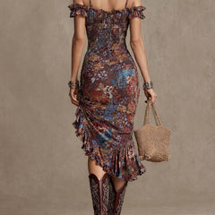 Floral midi dress by Christine Brewer featuring a casual, flowy design with vibrant floral patterns and a midi length.