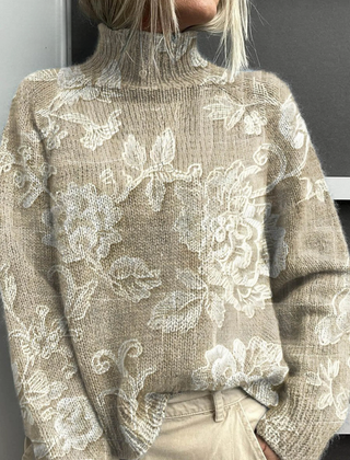 Christine Brewer Gemma turtleneck floral sweater for women featuring a colorful floral pattern and cozy knit fabric.