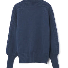 Christine Brewer Mila cable knit high neck sweater for women, featuring a cozy high neckline and textured knit pattern.