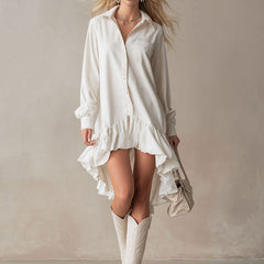 White denim ruffle midi dress by Christine Brewer showcasing a stylish evening dress with ruffle details and a midi length.