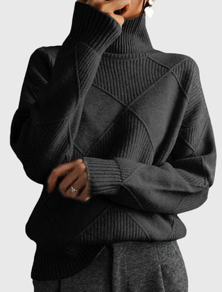 Cream-colored Laura turtleneck sweater for women by Christine Brewer, featuring a cozy knit design and ribbed collar.