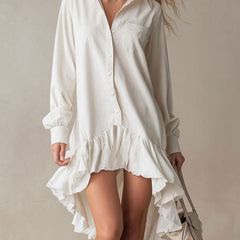 White denim ruffle midi dress by Christine Brewer, featuring a stylish evening dress with ruffle details and a fitted silhouette.