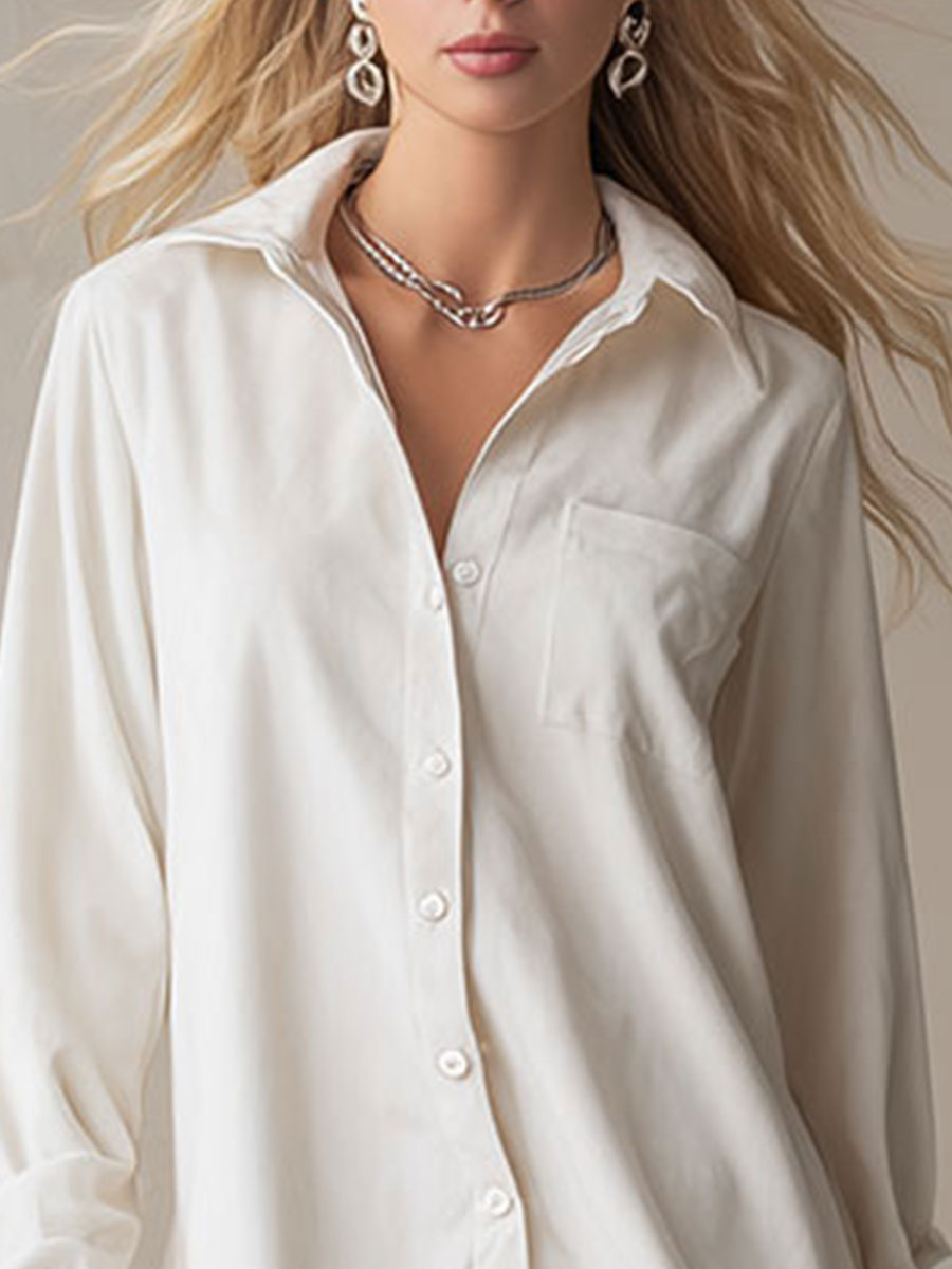 White denim ruffle midi dress by Christine Brewer featuring a fitted bodice and flowing skirt, perfect for evening wear.