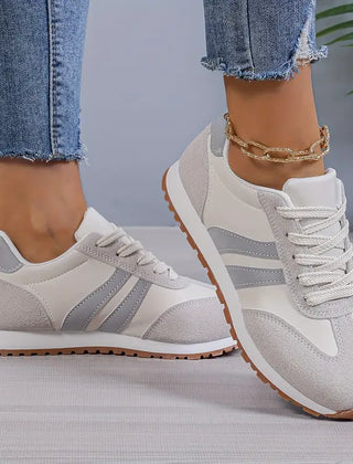 Comfortable women's orthopedic sneakers by Christine Brewer for everyday walking, featuring cushioned soles and supportive design.
