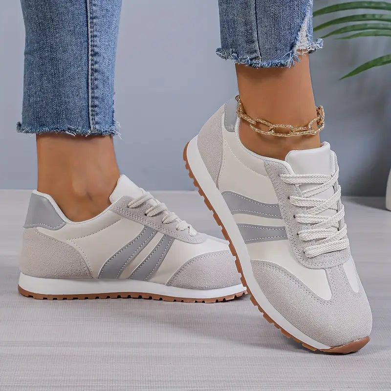 Comfortable women's orthopedic sneakers by Christine Brewer for everyday walking, featuring cushioned soles and supportive design.