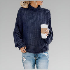 Amy Winifred ribbed orange sweater for women by Christine Brewer, featuring a cozy knit texture and fitted style.