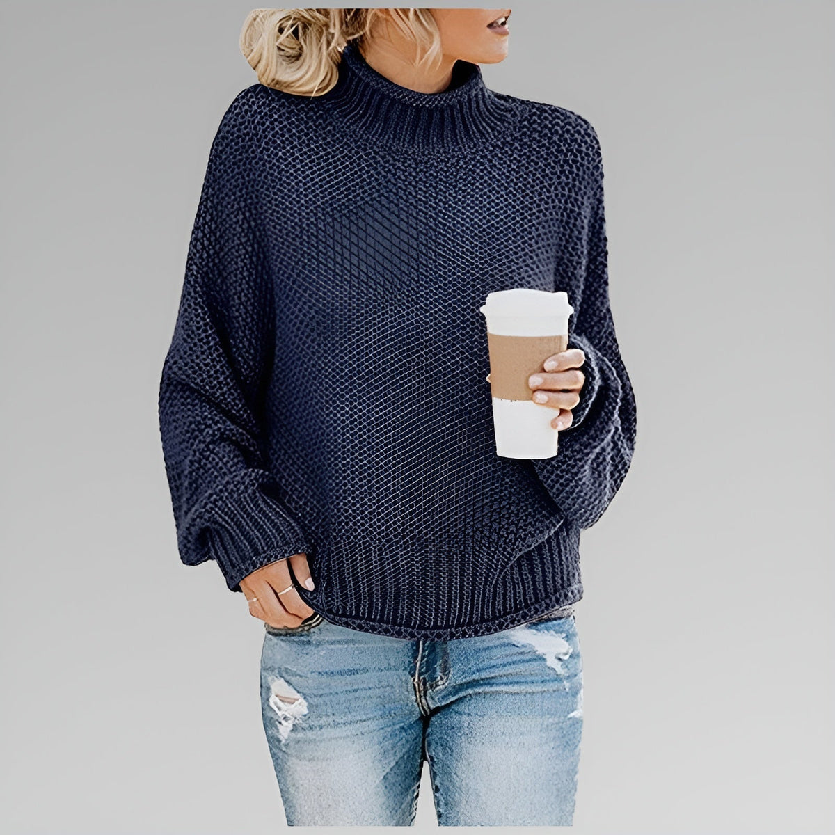 Amy Winifred ribbed orange sweater for women by Christine Brewer, featuring a cozy knit texture and fitted style.