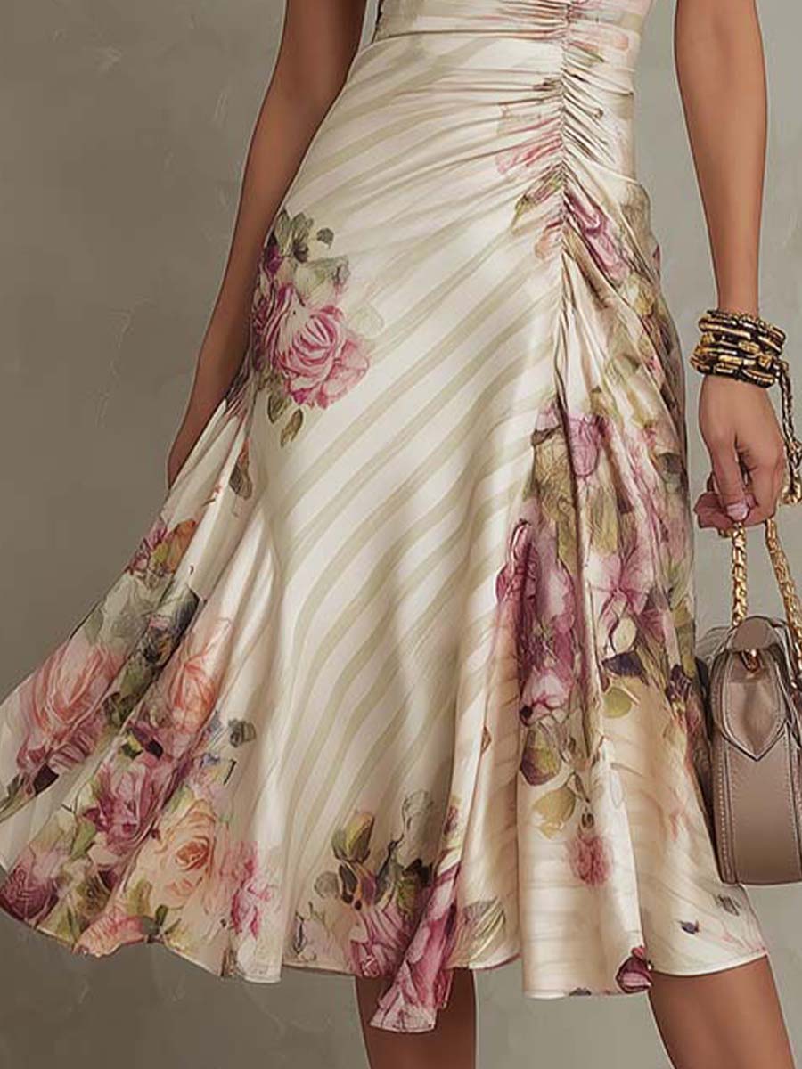 Christine Brewer chiffon floral midi dress, elegant evening dress with flowing fabric and vibrant floral pattern.