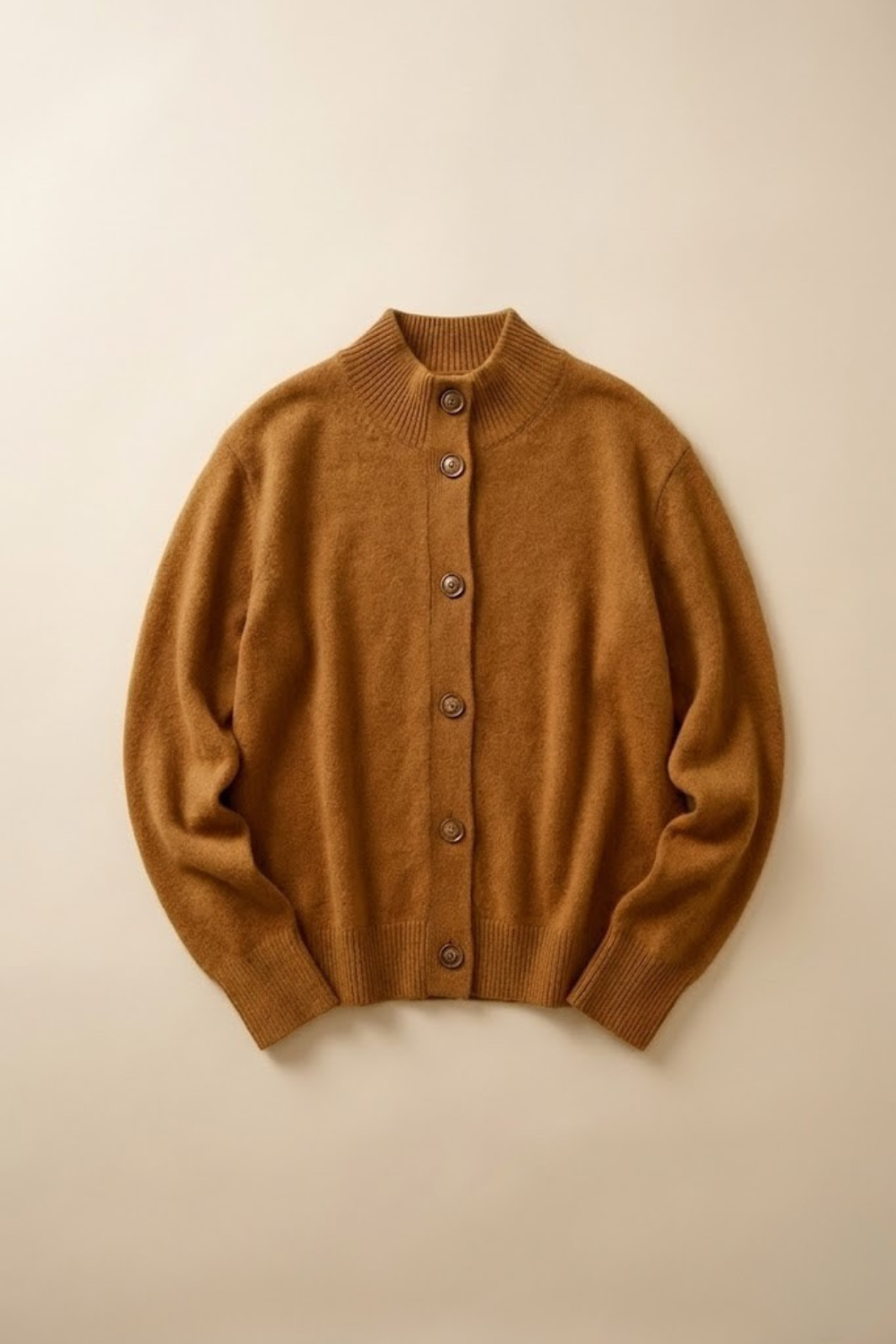Christina Christine Brewer cashmere high neck cardigan for women, featuring a soft, cozy knit with long sleeves and a fitted silhouette.