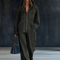 Women's casual loose retro denim jumpsuit with hood, zipper front, long sleeves, and front pockets by Christine Brewer.
