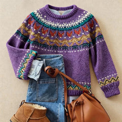 Women’s Nordic sweater by Christine Brewer, featuring a cozy knit pattern and ribbed cuffs, styled on a model.