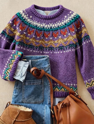 Women’s Nordic sweater by Christine Brewer, featuring a cozy knit pattern and ribbed cuffs, styled on a model.
