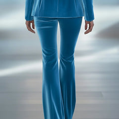 Blue loose velvet flared women’s pants by Christine Brewer, featuring a relaxed fit and stylish flared design.