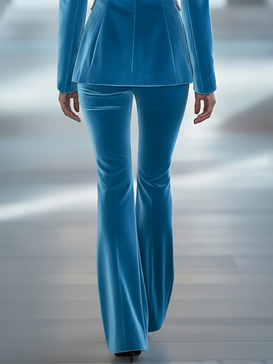 Blue loose velvet flared women’s pants by Christine Brewer, featuring a relaxed fit and stylish flared design.
