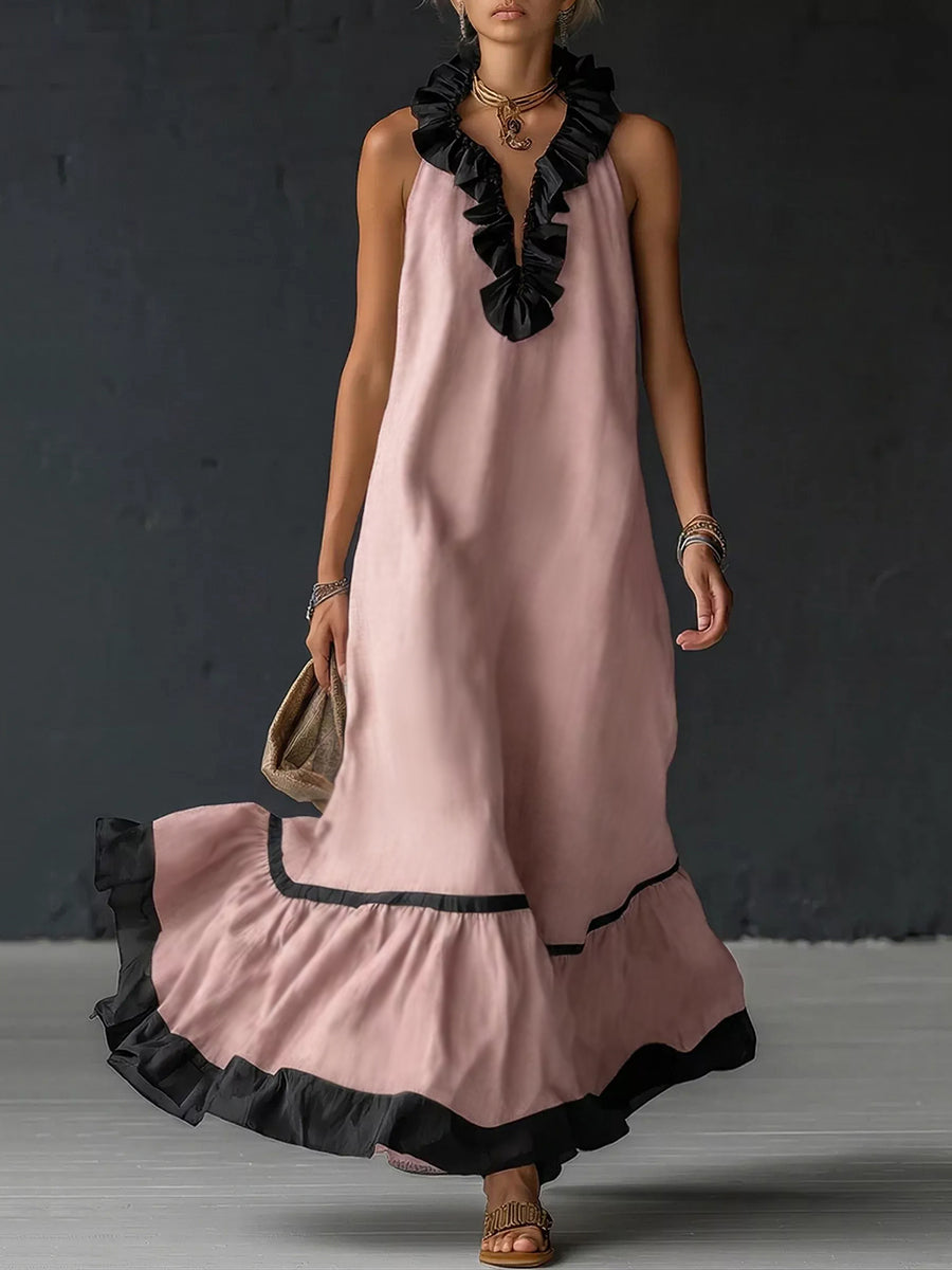 A-line loose maxi dress with contrast color pleats, ruffle trim, split-joint V-neck, by Christine Brewer, shown on a model.