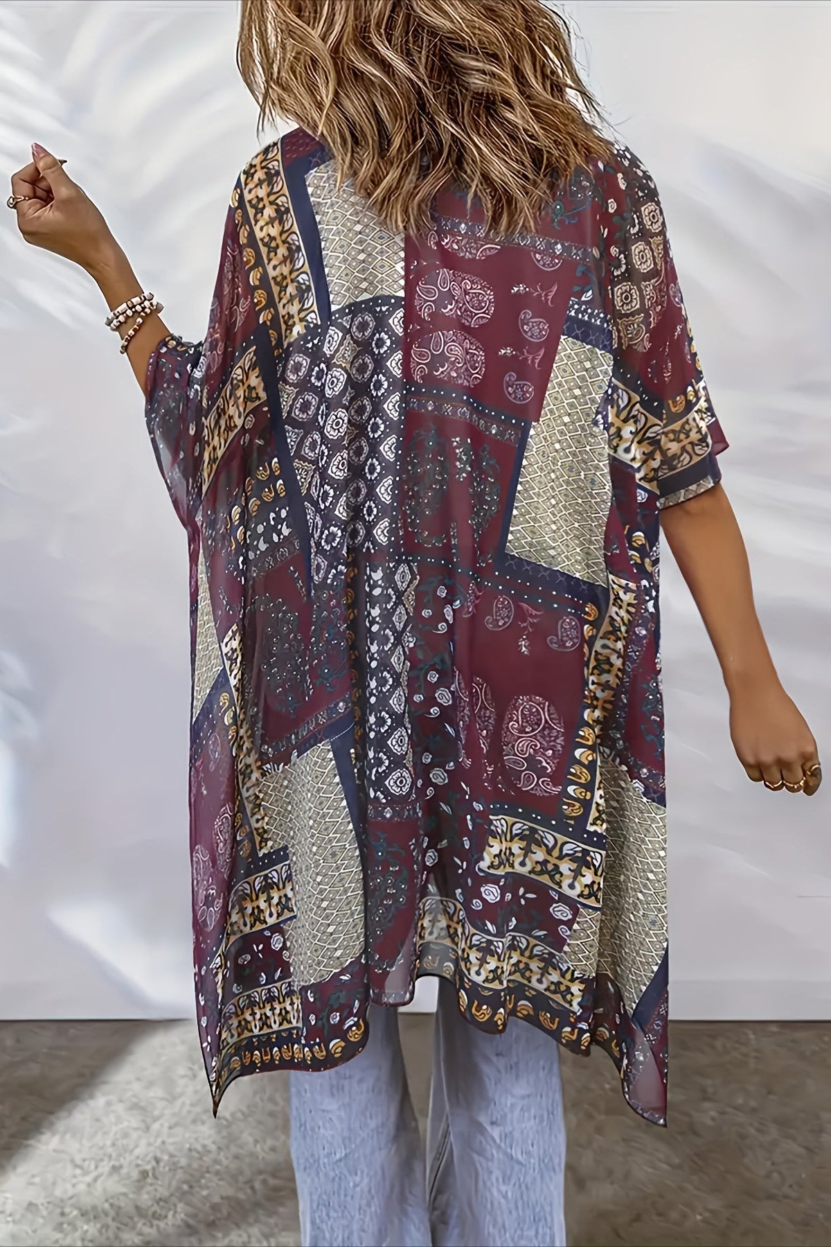Plus size Christine Brewer kimono cardigan, semi-sheer open-front top with side slits, lightweight and flowy women’s fashion.