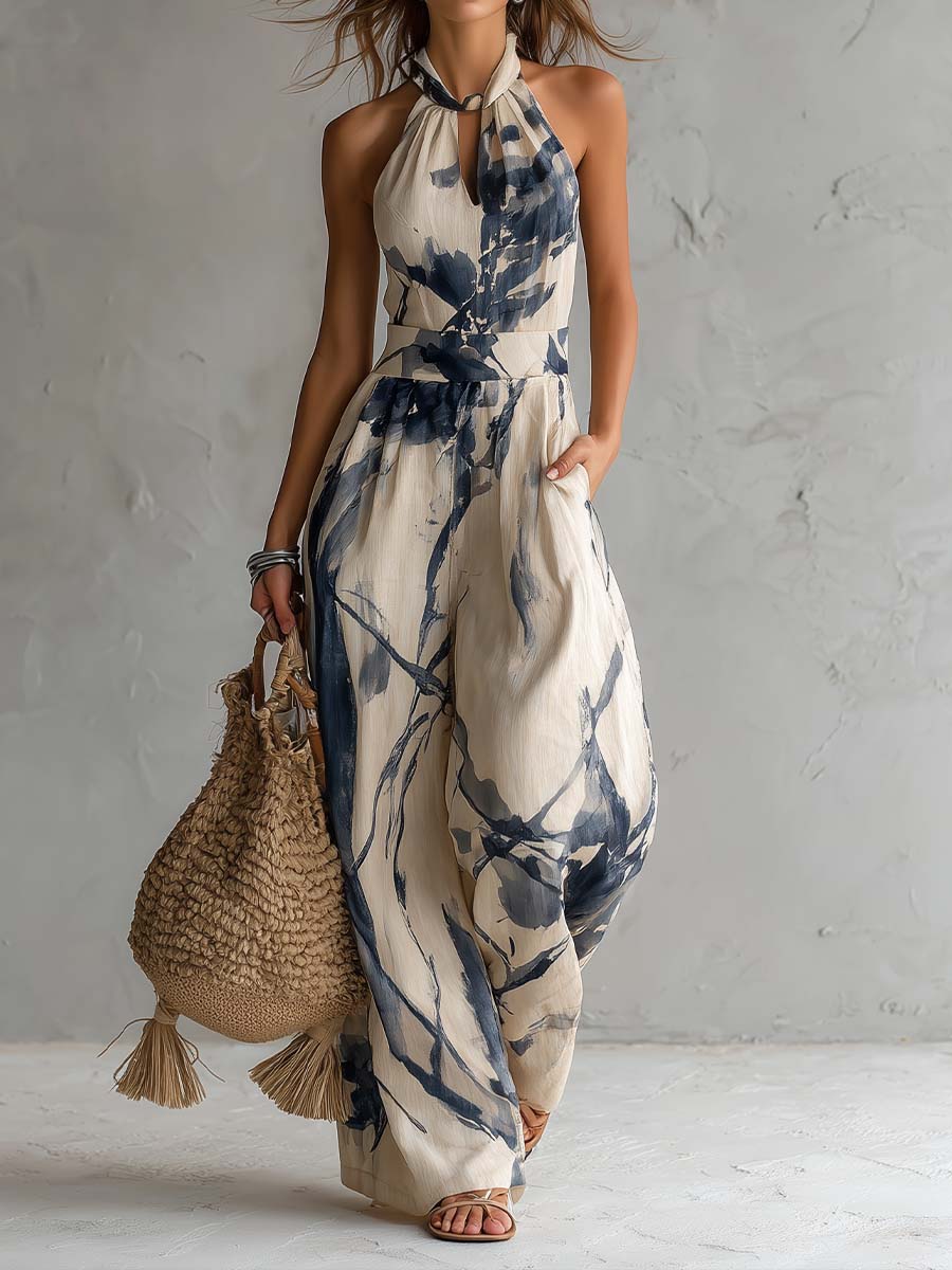 White ink wash print women's halter neck wide-leg jumpsuit with pockets, designed by Christine Brewer.