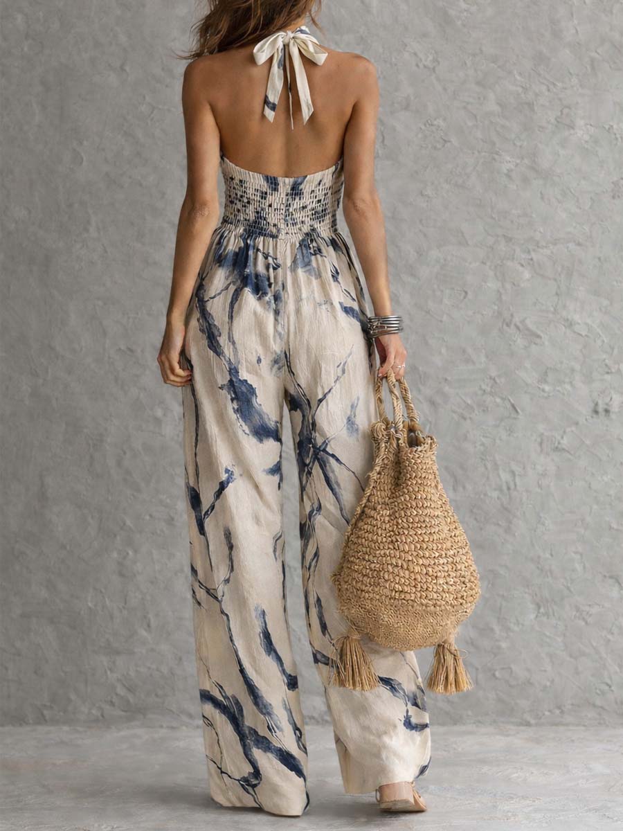 White ink wash print halter neck wide-leg jumpsuit with pockets for women by Christine Brewer, featuring a stylish, relaxed fit.
