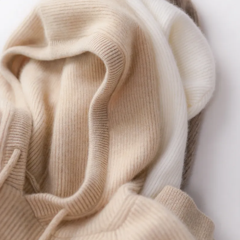 Christine Brewer Claudia women's cashmere hoodie in soft beige, featuring a relaxed fit and hooded design.