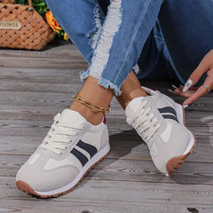 Women's orthopedic comfort sneakers by Christine Brewer, designed for everyday walking with supportive features and cushioned soles.