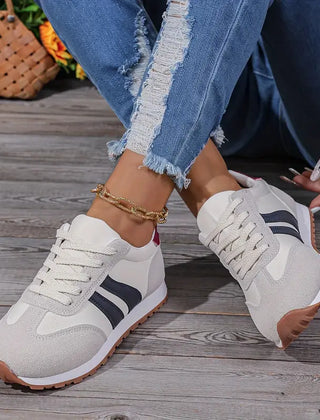 Women's orthopedic comfort sneakers by Christine Brewer, designed for everyday walking with supportive features and cushioned soles.