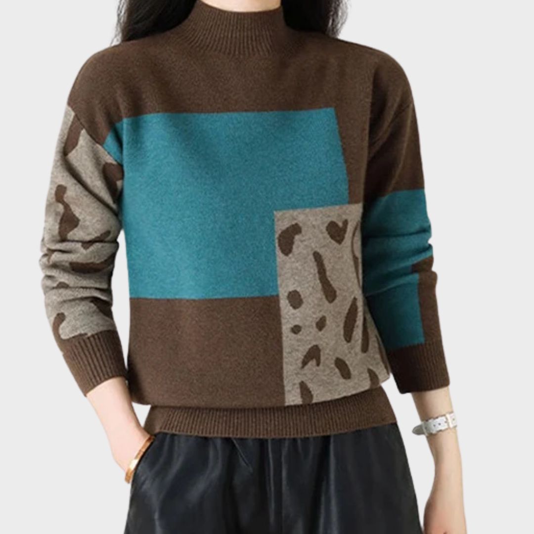 Leopard print graphic sweater for women by Christine Brewer, featuring a stylish, cozy design in a close-up view.