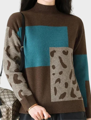 Leopard print graphic sweater for women by Christine Brewer featuring a cozy knit design and stylish animal print pattern.