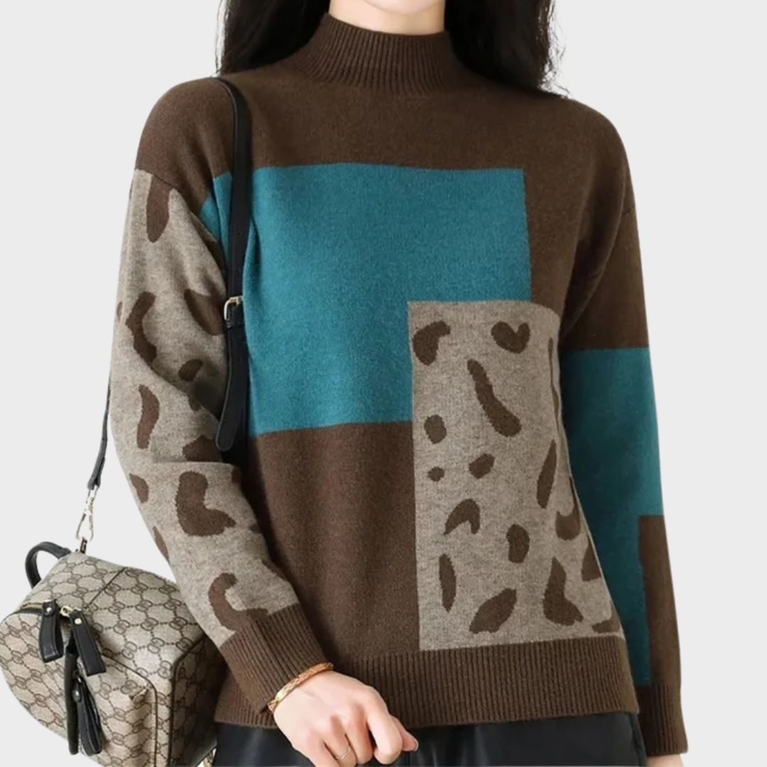 Leopard print graphic sweater for women by Christine Brewer featuring a cozy knit design and stylish animal print pattern.