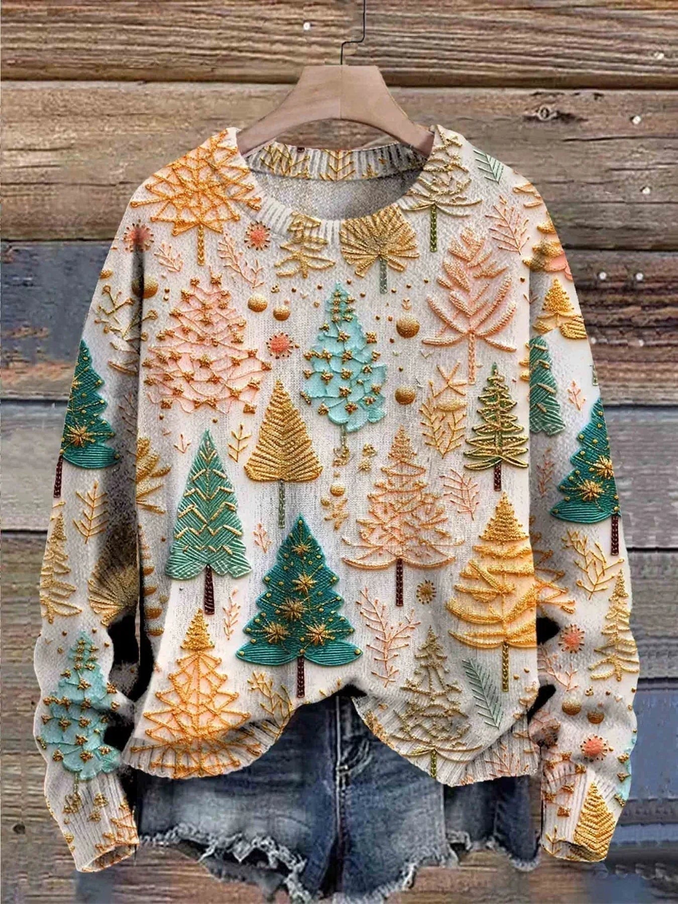 Stylish Christmas sweater for women by Christine Brewer featuring festive patterns and cozy knit fabric.