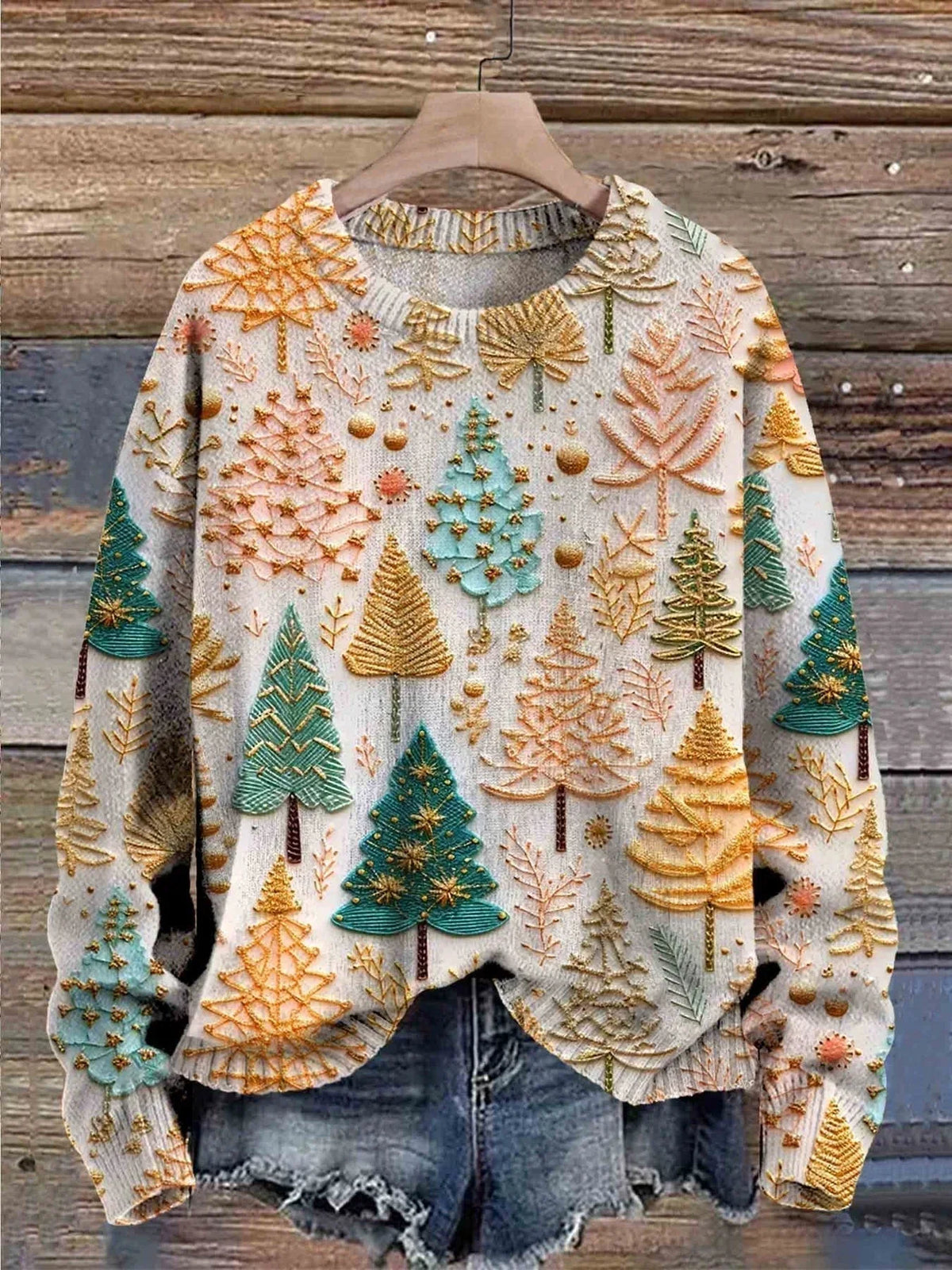 Stylish Christmas sweater for women by Christine Brewer featuring festive patterns and cozy knit fabric.