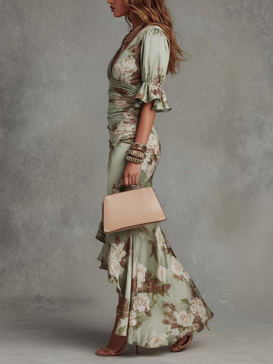 V-neck maxi dress for women by Christine Brewer, flowing fabric, sleeveless design, and elegant silhouette.