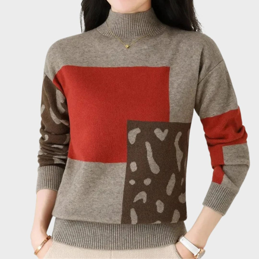 Leopard print graphic sweater for women by Christine Brewer, featuring a cozy knit design and stylish animal print pattern.