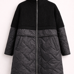 Long quilted puffer jacket for women by Christine Brewer, featuring a cozy design and stylish quilted pattern.