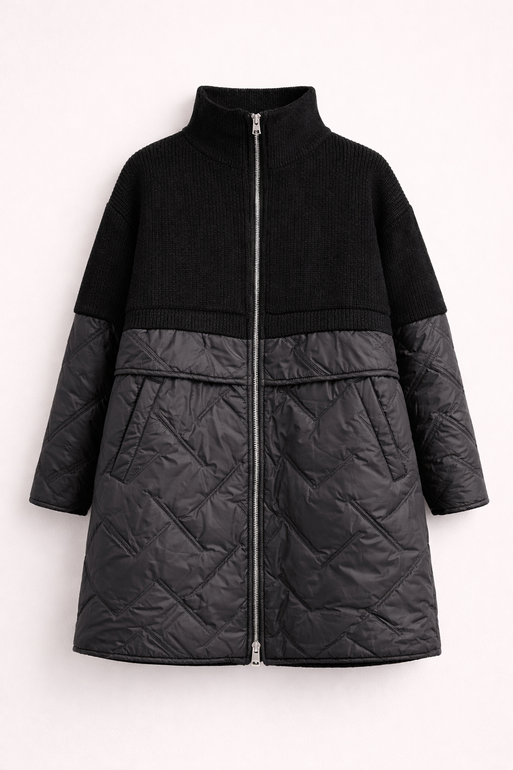 Long quilted puffer jacket for women by Christine Brewer, featuring a cozy design and stylish quilted pattern.