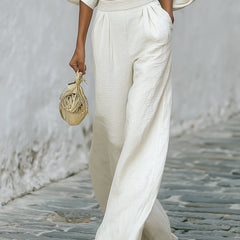 Cream textured lantern sleeve two-piece set for women by Christine Brewer, featuring stylish pants and a matching top.