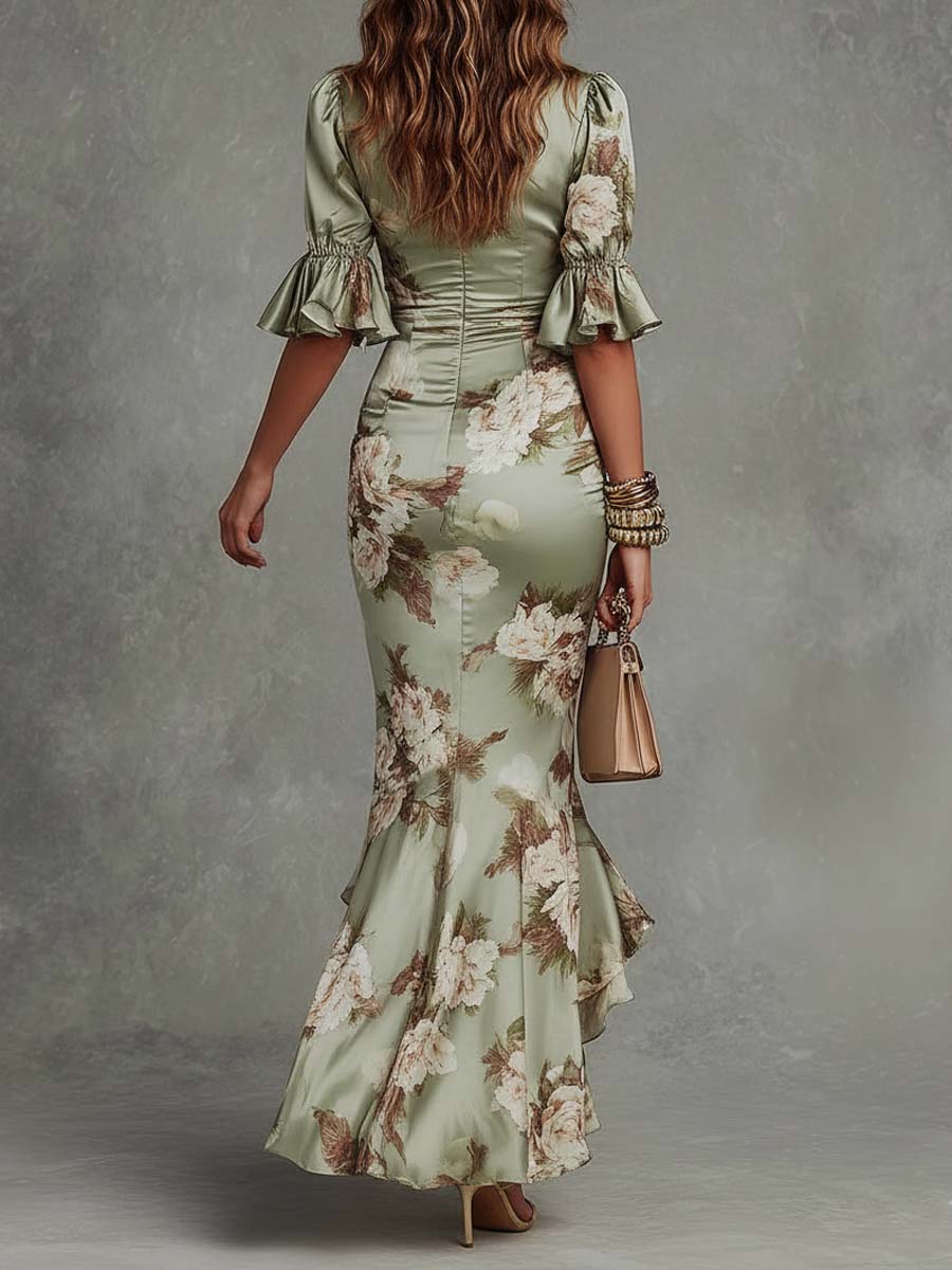 V-neck maxi dress for women by Christine Brewer, flowing fabric, sleeveless design, and elegant silhouette.