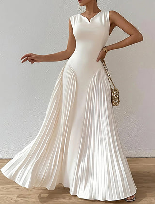 White Christine Brewer A-Line maxi dress with loose pleats, V-neck, and solid color design, perfect for elegant, flowy style.
