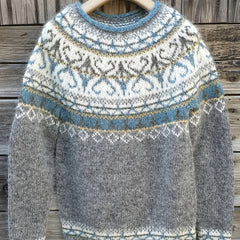 Fair Isle Nordic sweater for women by Christine Brewer featuring intricate winter patterns and cozy knit fabric.