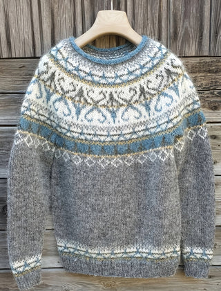 Fair Isle Nordic sweater for women by Christine Brewer featuring intricate winter patterns and cozy knit fabric.
