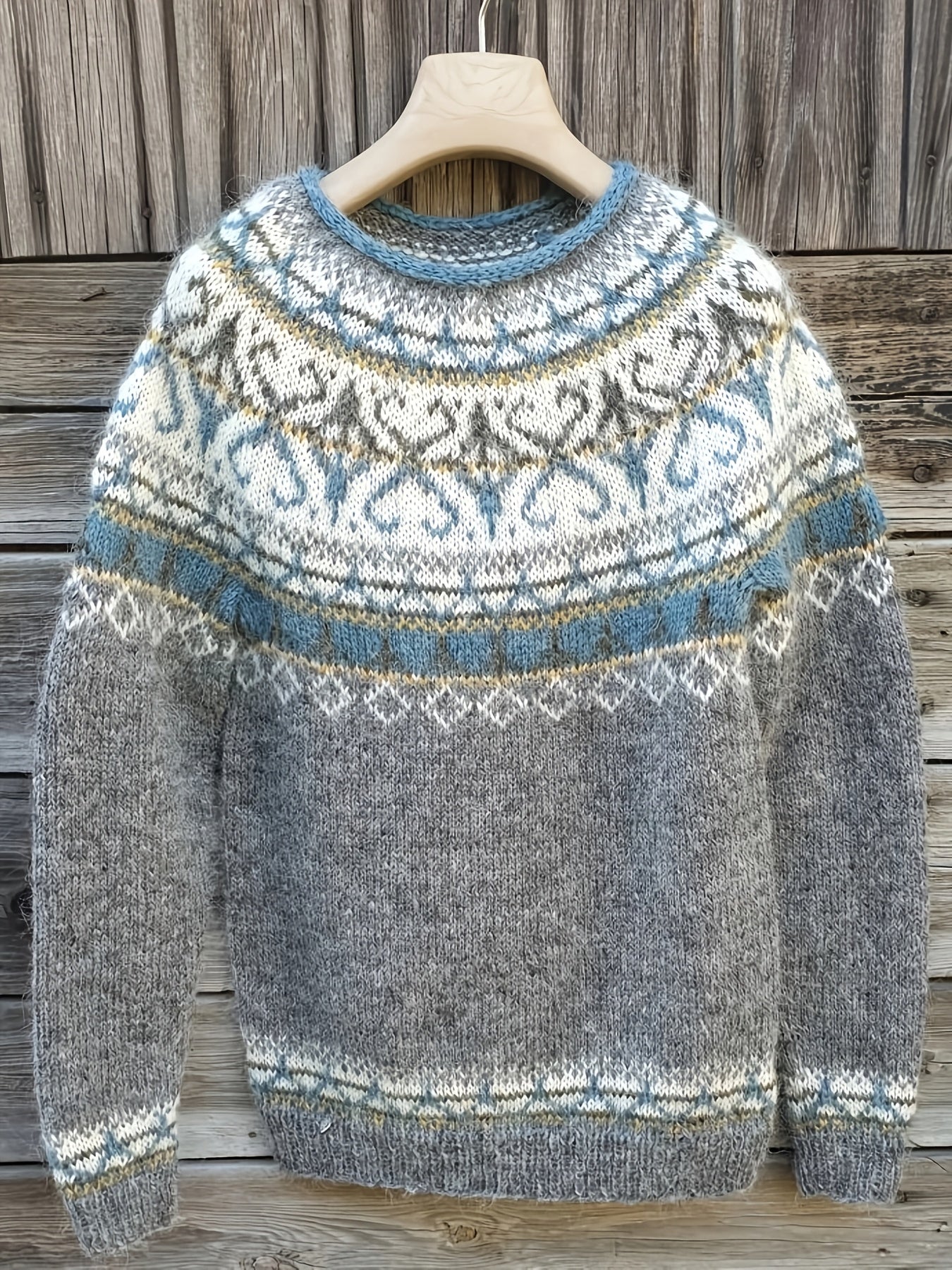 Fair Isle Nordic sweater for women by Christine Brewer featuring intricate winter patterns and cozy knit fabric.